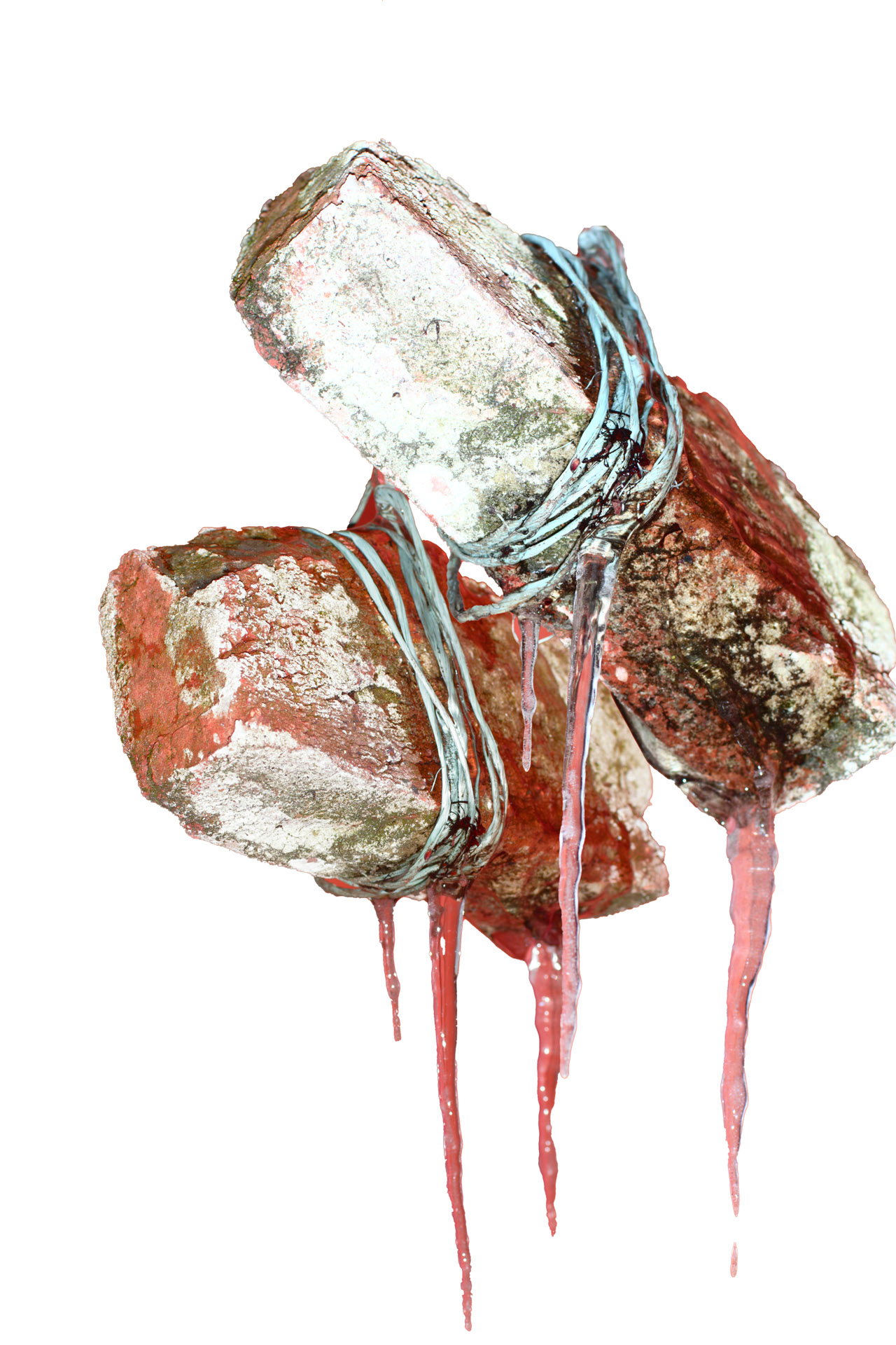 Photo of icicles hanging from bricks