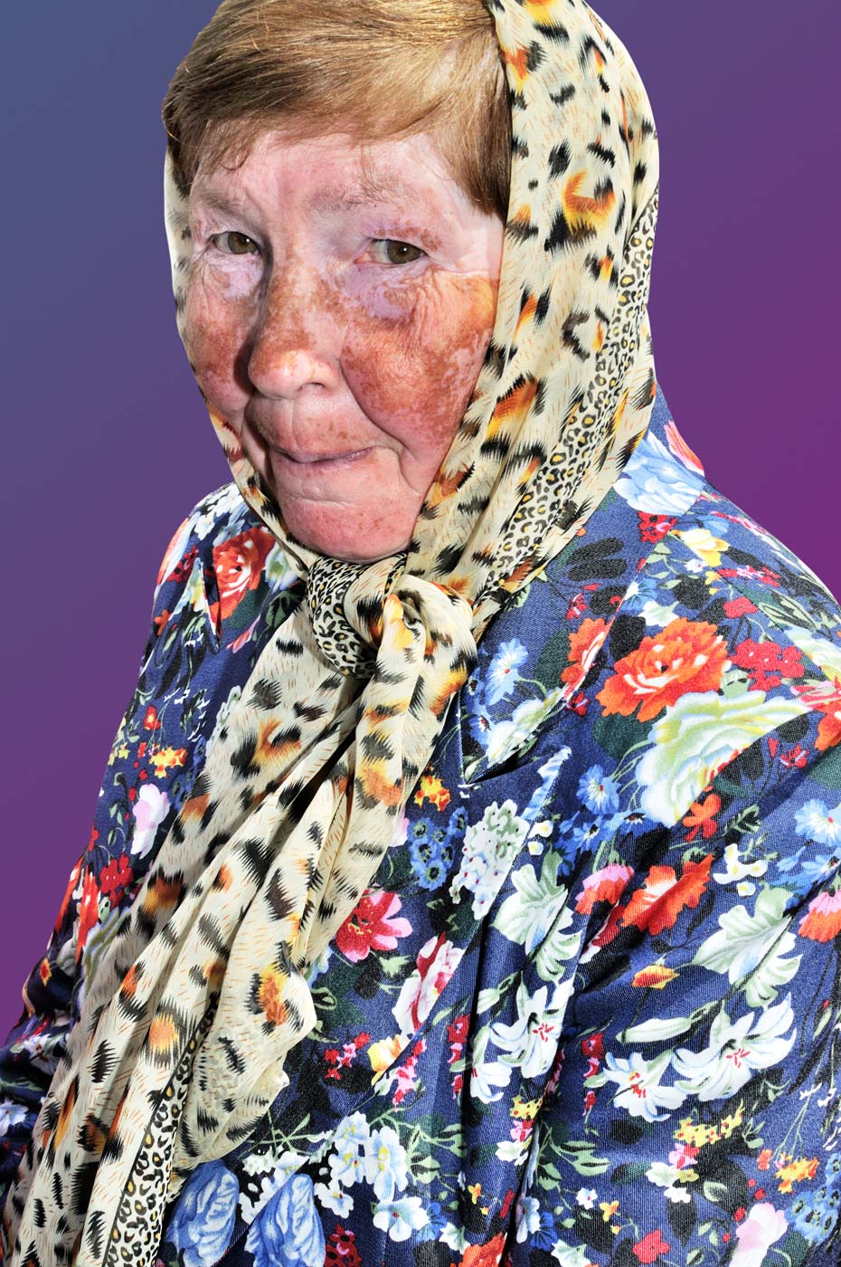 Old lady dressed in colorful jacket