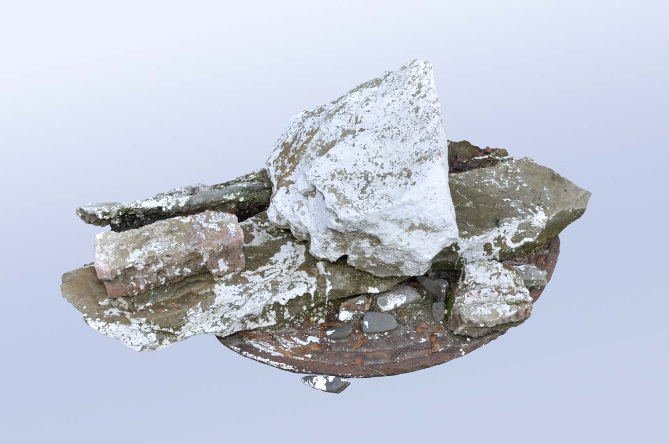 Manhole cap protected with large stones painted with white